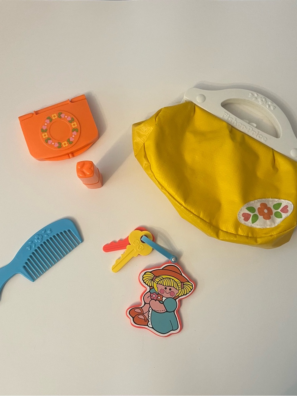 Vintage Fisher-Price Purse Playset with Blue Comb, keys and Orange Accessories